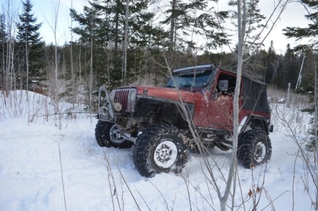 red jeep in the snow