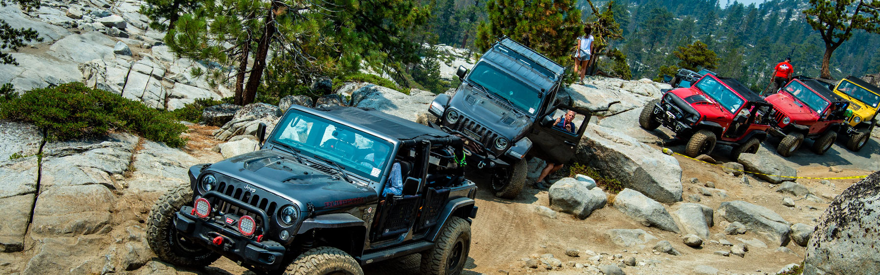 row of jeeps on the rubicon