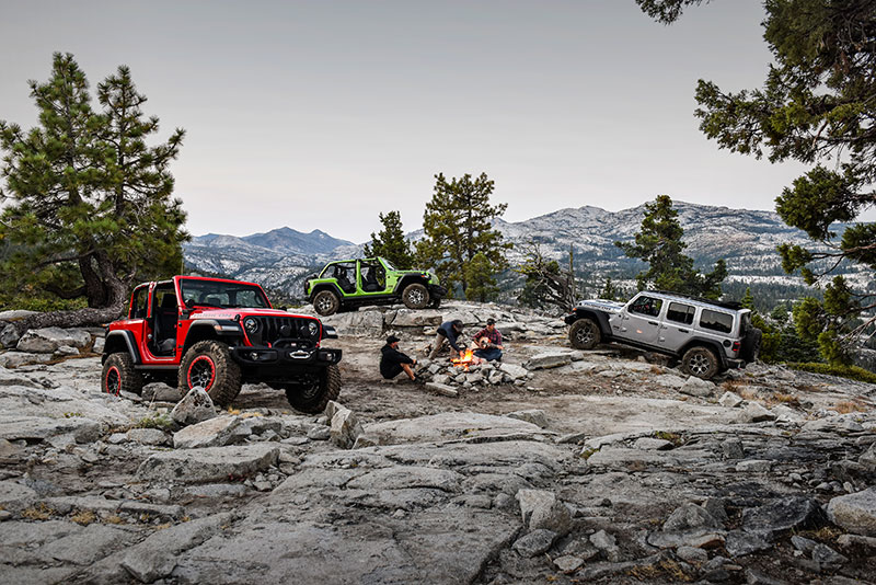 jeeps around campfire