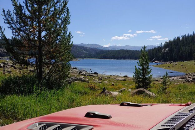 red jeep by lake