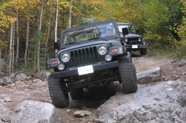 black jeep on a rock