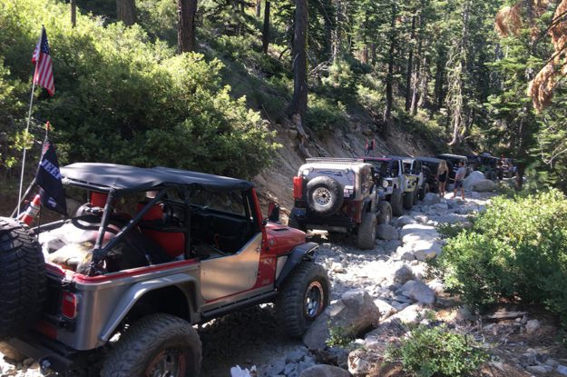 row of jeeps on the trail