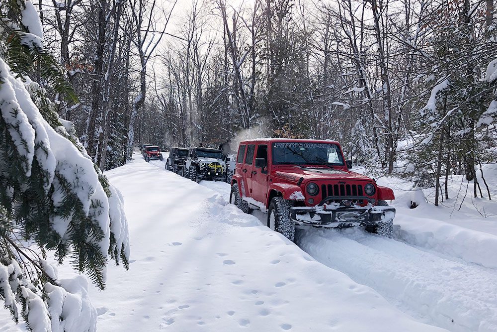red jeep in snow