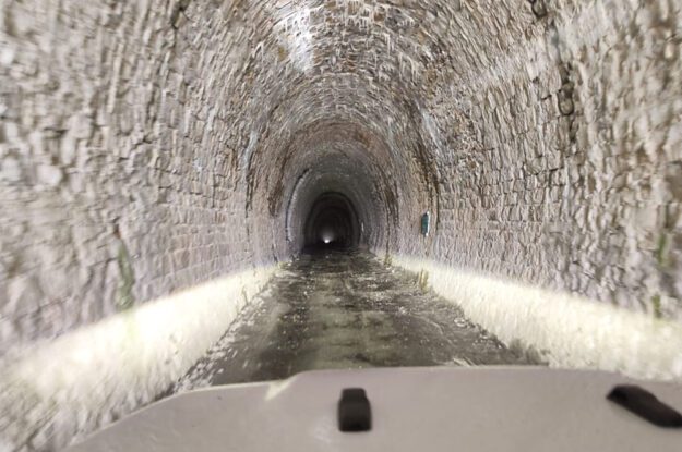 driving through tunnel in alps