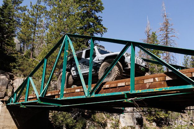 Casey Currie's Jeep on a bridge.