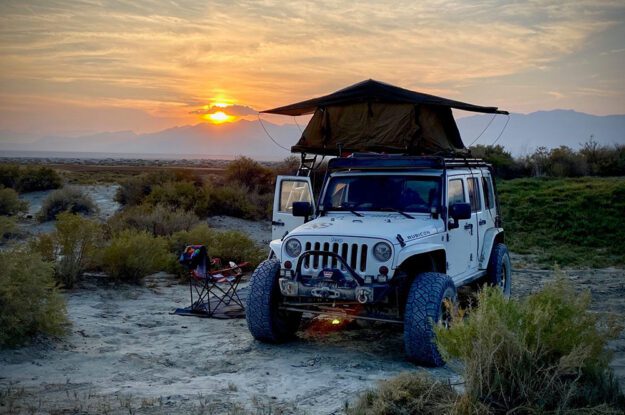 jeep with a popup tent