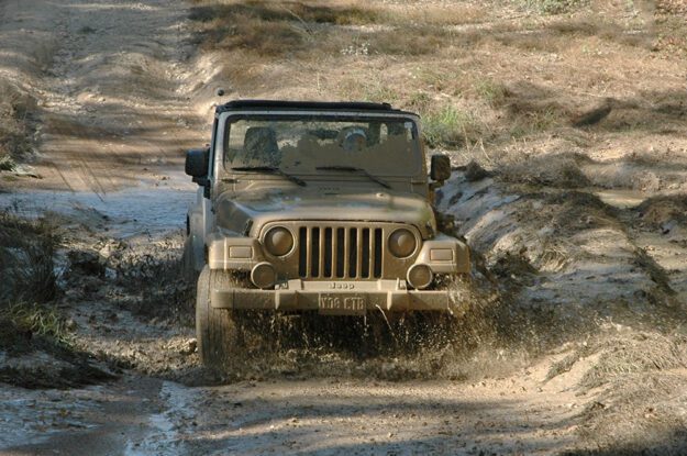 jeep covered in mud