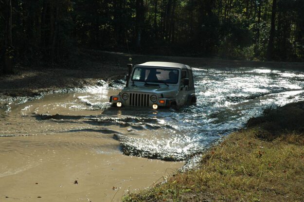 jeep crossing stream