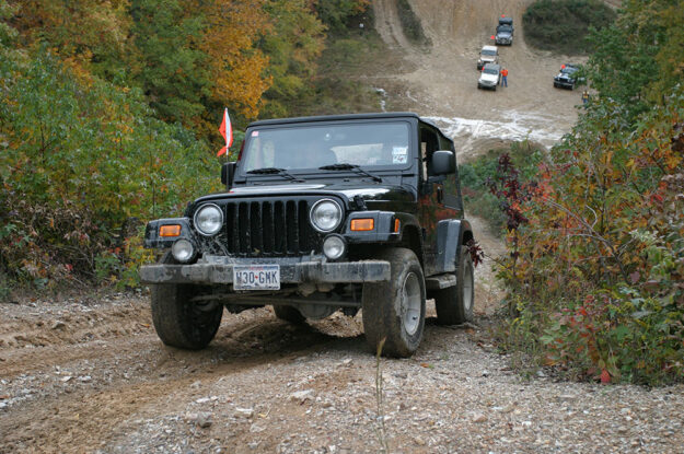 black jeep top of hill