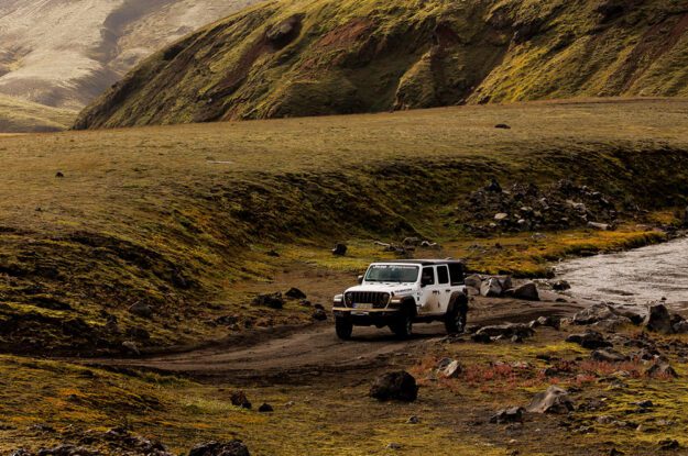 jeep in valley in iceland