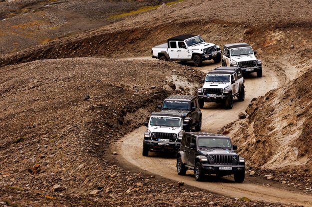 group of jeeps on curvy road