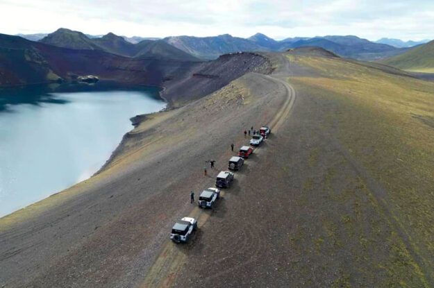 jeeps along a ridge