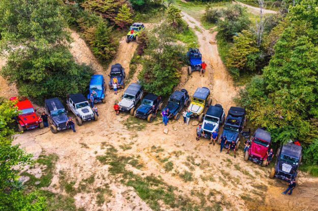 aerial view jeeps on dirt