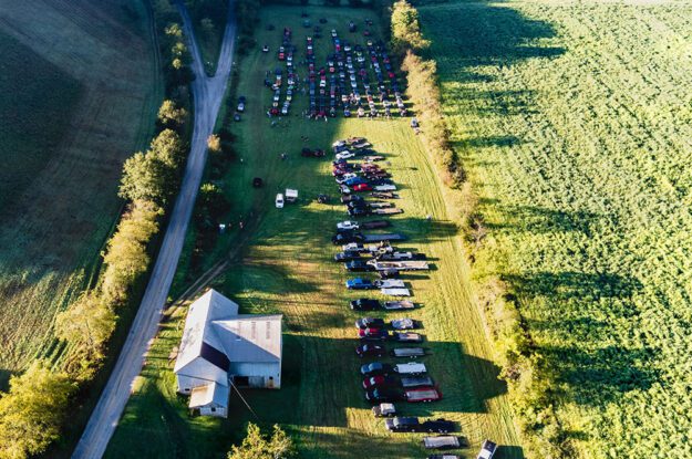 jeeps lined up in field