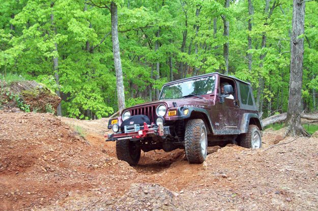 burgundy jeep at land between the lakes