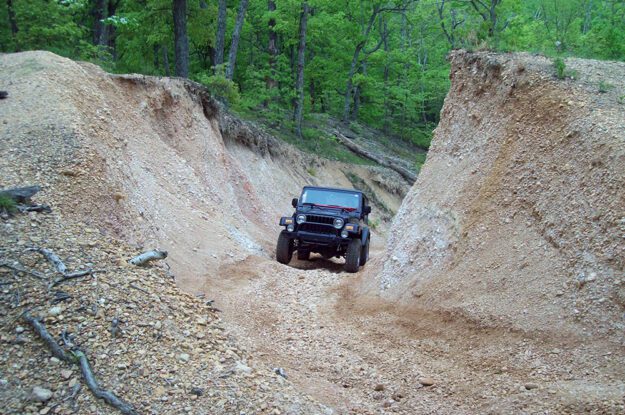black jeep in a gully