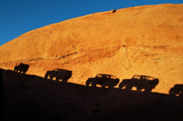 Shadows of Jeeps.