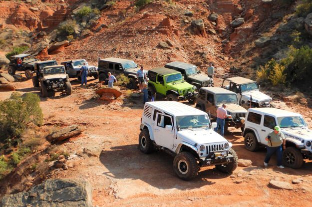 group of jeeps staging