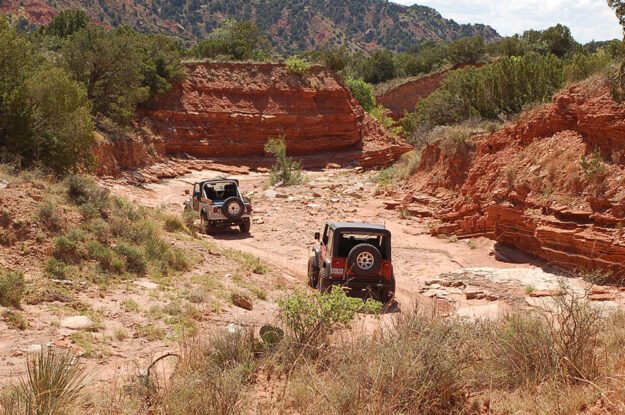 two jeeps in valley