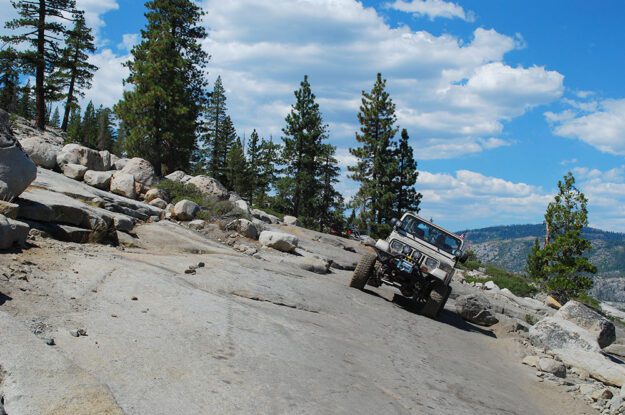 Jeep side-hilling on rock slab.