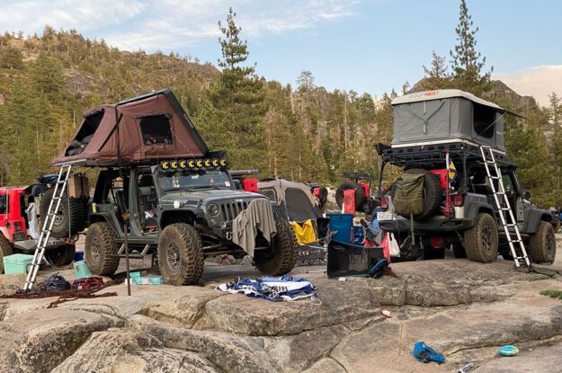 Jeeps with rooftop tents.