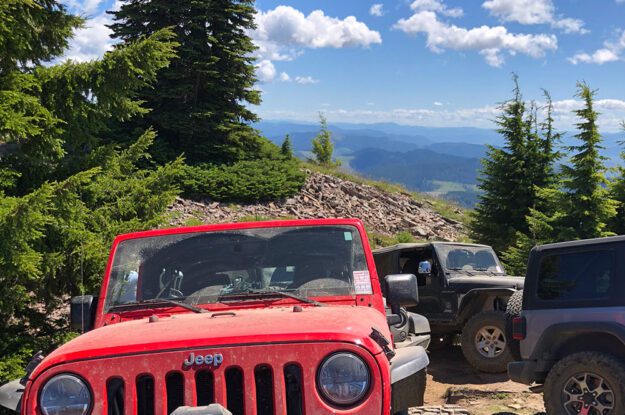jeeps at top of hill