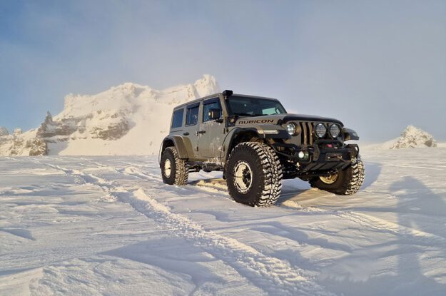 rubicon in front of icy hill