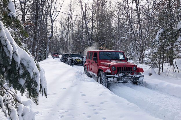 jeeps in a row in the snow