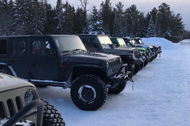 row of jeeps in the morning