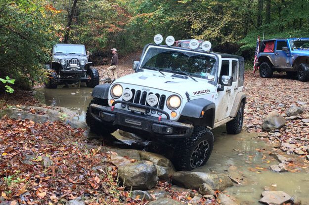 Jeep crossing strream