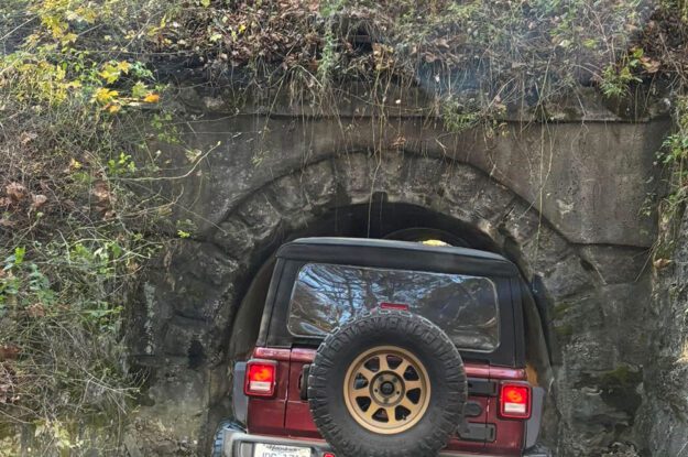 jeep entering tunnel