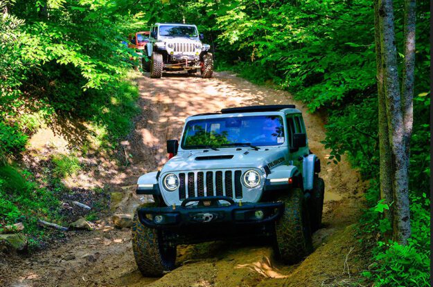 Jeep on rutted dirt road