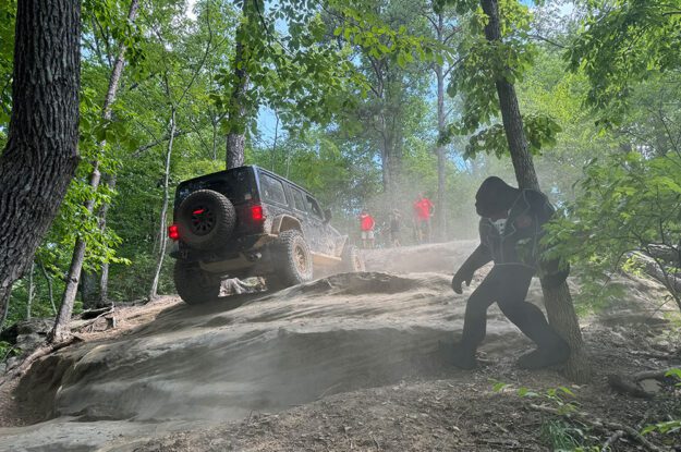 Jeep climbiing rock hill