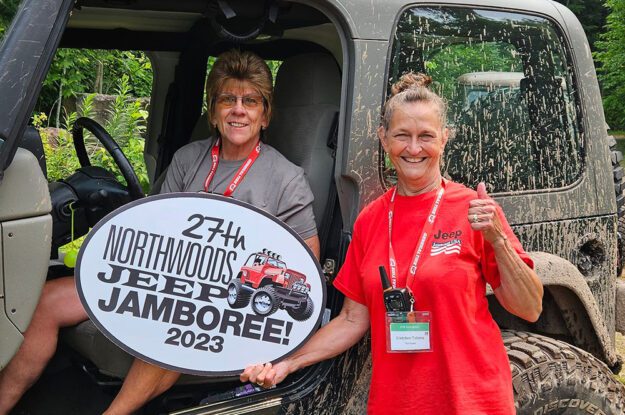 Trail guide and driver with sign