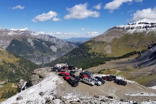 Jeeps and snowy mountains