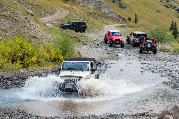 Jeep crossing a stream