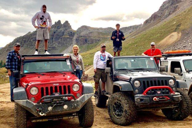 People with their jeeps