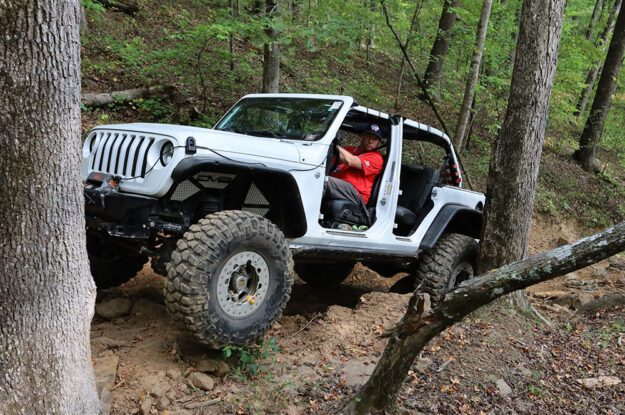 white jeep on trail