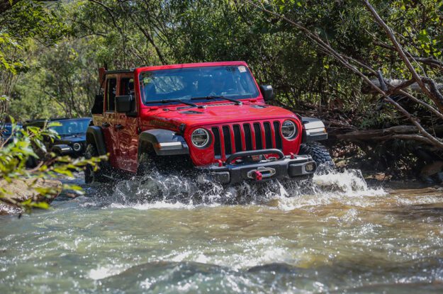 red jeep in water