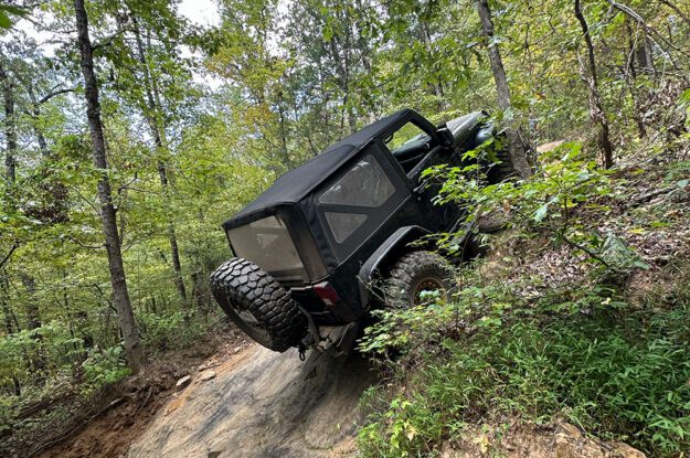 black jeep going up hill