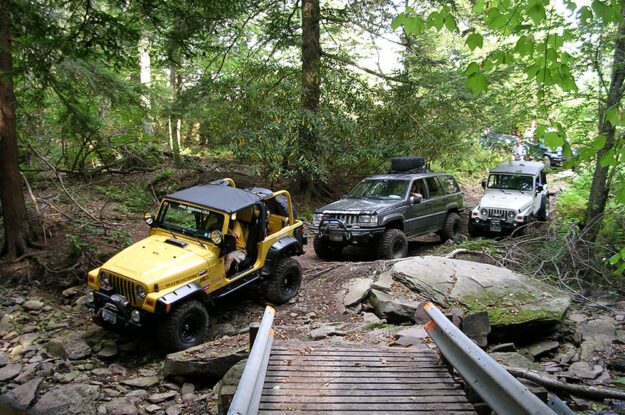 three jeeps in a row