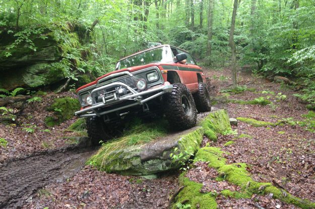 Jeep Wagoneer on a rock