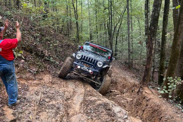 black jeep in mud