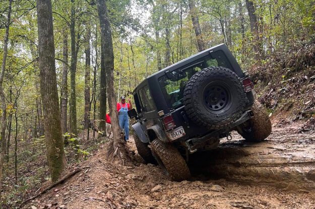 black jeep leaning over