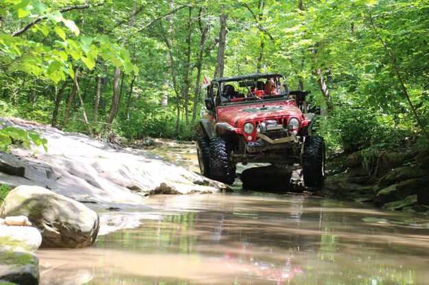 red jeep and water