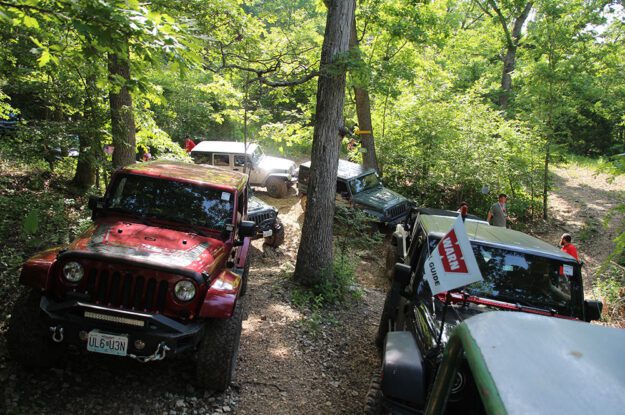 jeeps lined up by trail guide