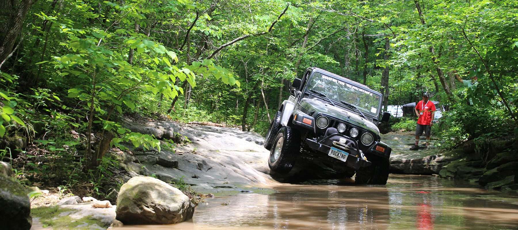 jeep in water top of ozarks